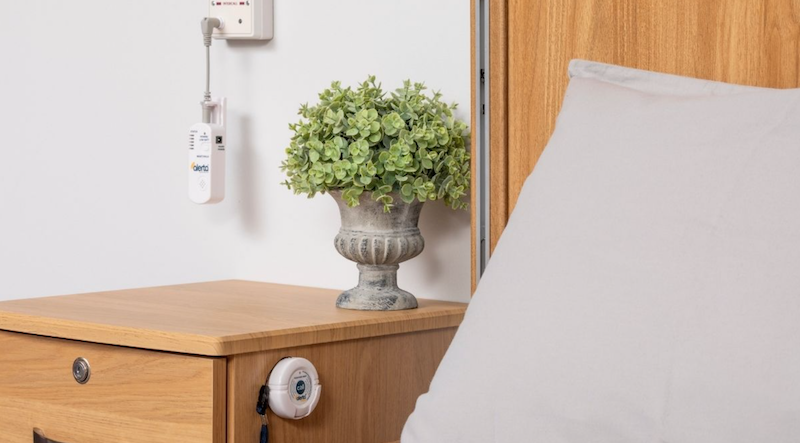 Nurse Call Button in use by bedside Nurse Call Button in use by bedside